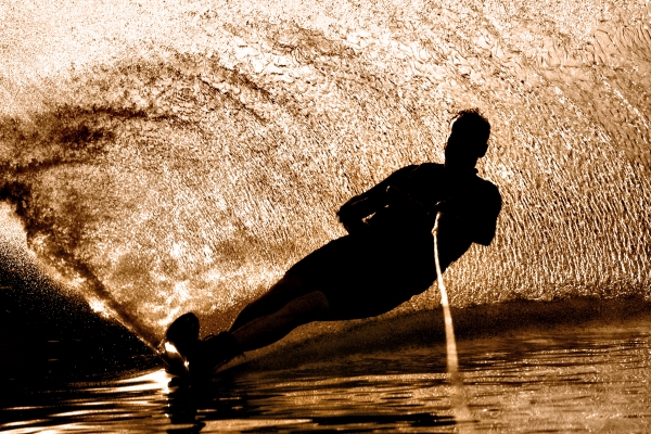 water skiing in the back light