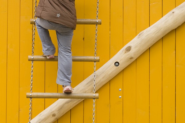 rope ladder in front of yellow