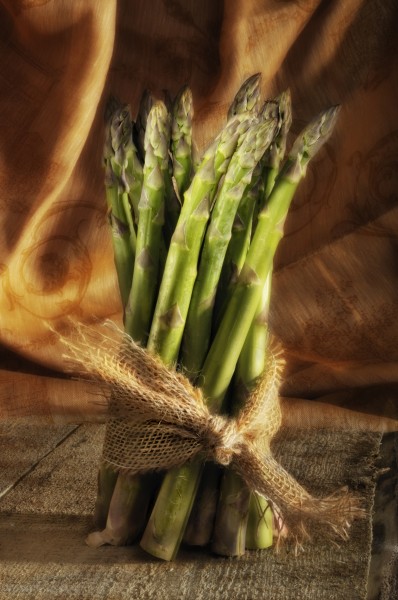green asparagus in front of rustic