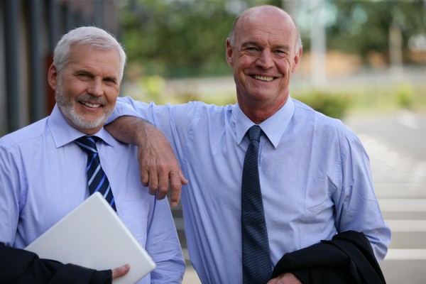 portrait of older men in suits