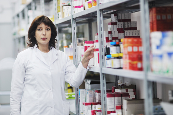 woman worker in pharmacy company