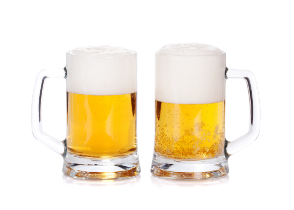 Two beer mugs isolated on a white background - Royalty free photo ...