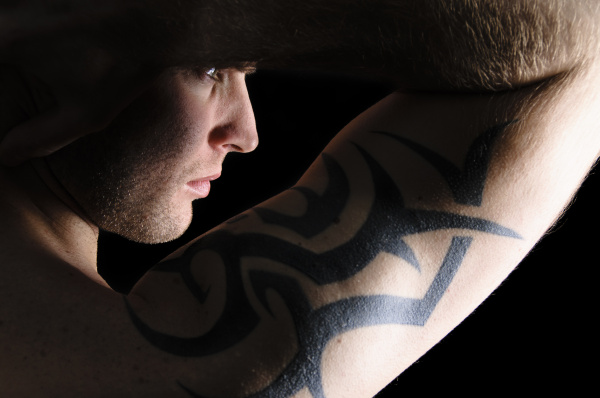 portrait of a man with tattoos