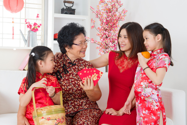 asian-family-celebrate-chinese-new-year-at-home-royalty-free-image