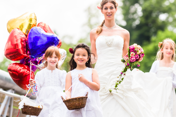 bride in wedding dress with flower