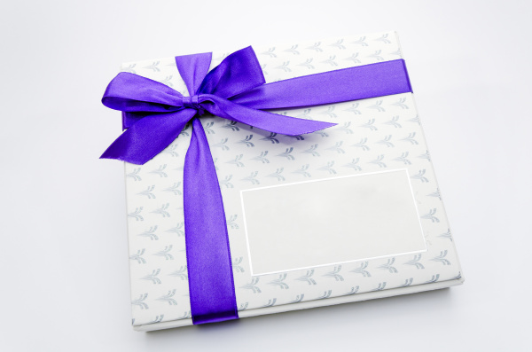 printed over a purple ribbon gift