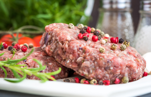 raw minced hamburger meat with herb