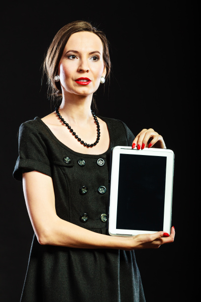 retro style woman showing a tablet