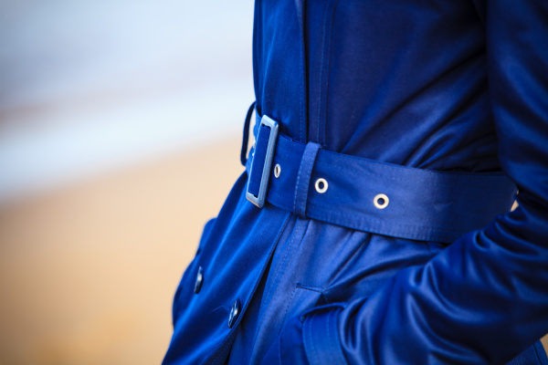 female fashion closeup blue coat