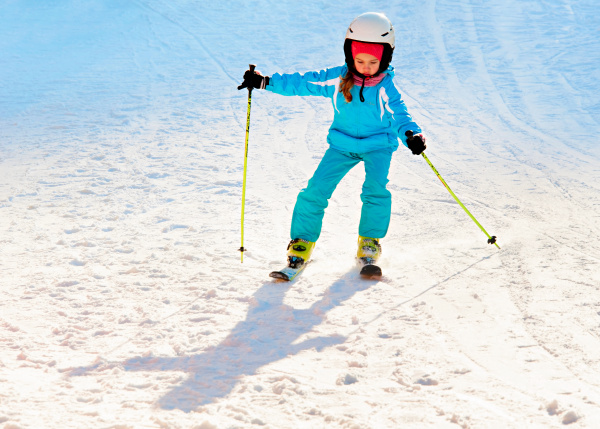 girl skiing at ski resort