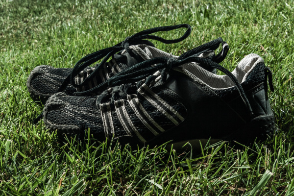 pair of black sport shoes on