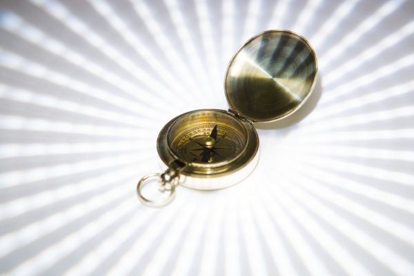 brass compass close up