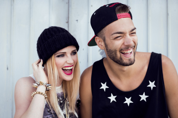 stylish young couple laughing