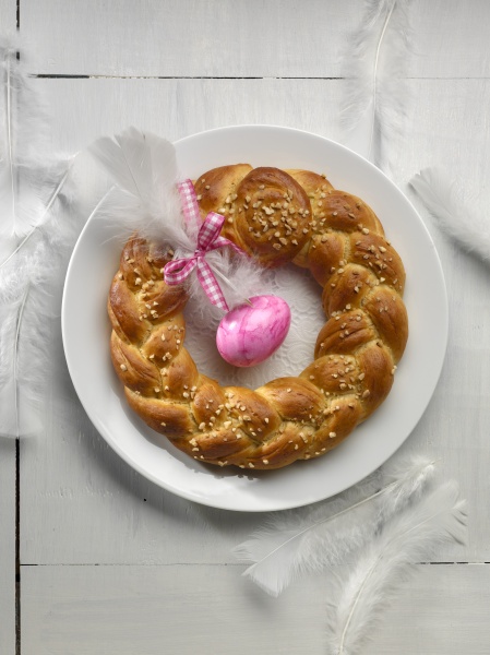an easter wreath with a pink