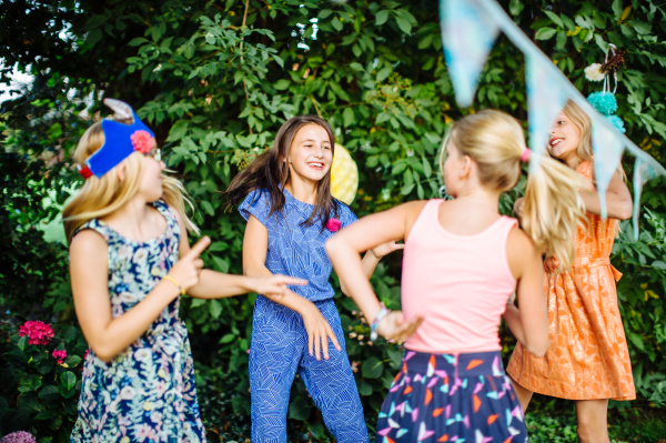 girls dancing at summer garden party