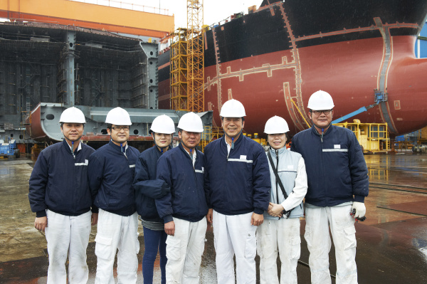 portrait of workers at shipyard