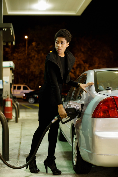 woman at gas station