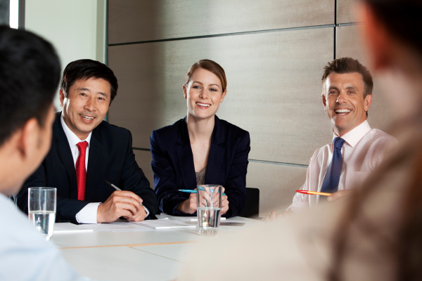 multiracial businesspeople in meeting