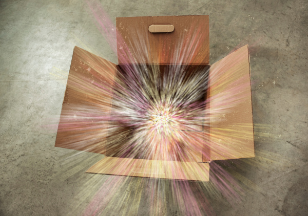 open cardboard box with sparks