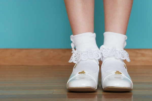 girl wearing white shoes