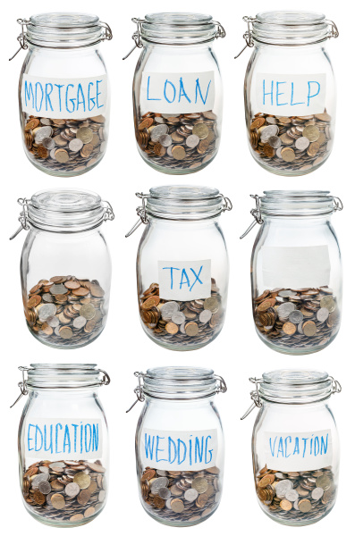 glass jars with coins for different