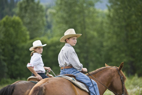 girl and boy horseriding
