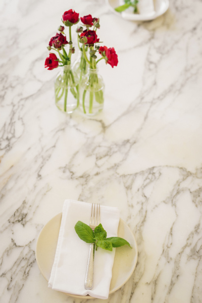 a marble tabletop and a vase