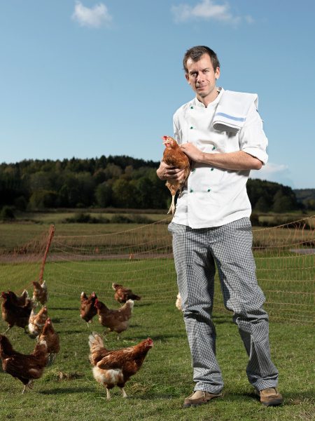 chef with hens
