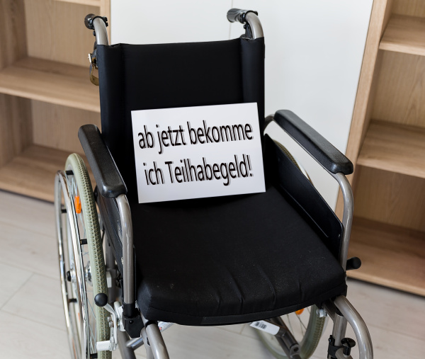 an empty wheelchair stands in front