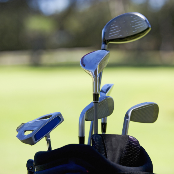 close up of golf clubs in