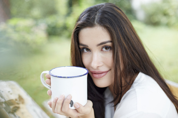 portrait of smiling woman relaxing with