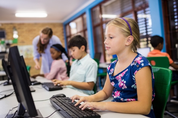 children looking their computer