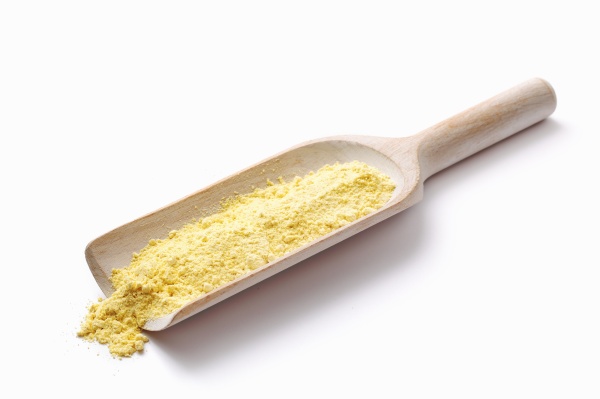 lupin flour on a wooden scoop