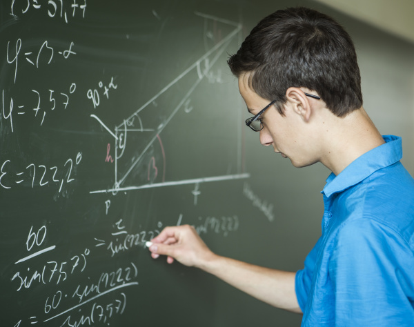 austria student calculating at blackboard