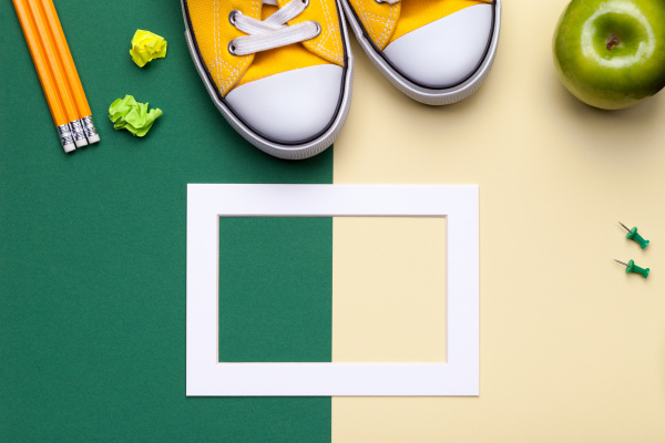 school accessories on green and yellow