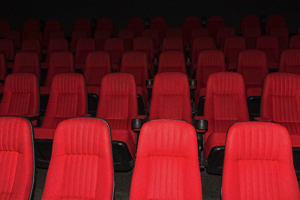 empty movie theater with red seats