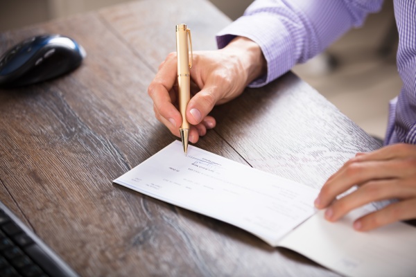 Businessperson s Hand Signing Cheque - Stock Photo - #22642535 ...