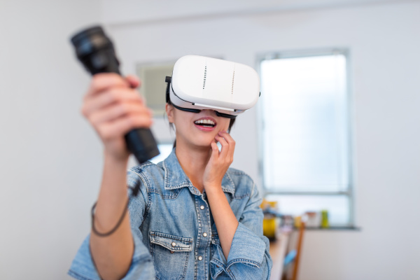 woman play game with virtual reality