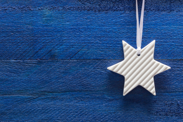 christmas card with star on blue