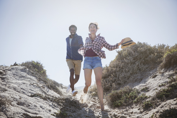 playful energetic multi ethnic couple