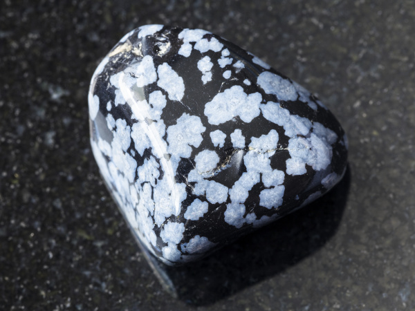 Tumbled Snowflake Obsidian Gem Stone On Dark Stock Photo Panthermedia Stock Agency