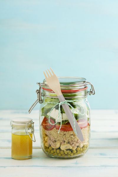 preserving jar of mixed salad with