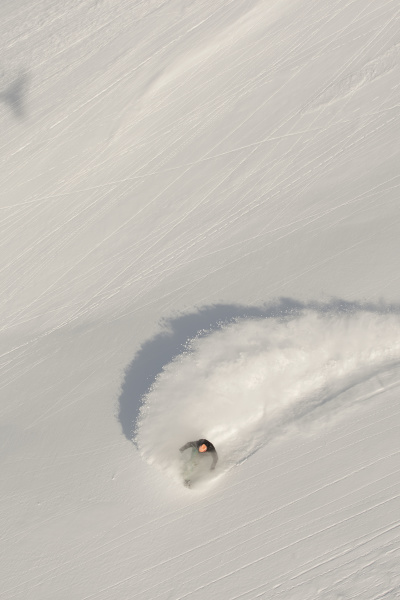aerial view of snowboarder on snowy