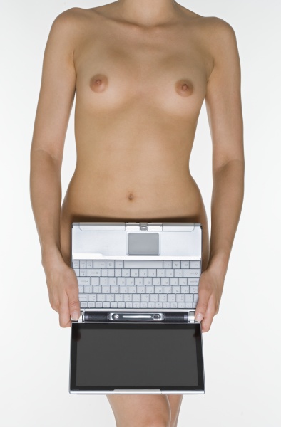 nude female holding laptop computer