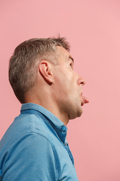 The squint eyed man with weird expression isolated on - Stock image ...