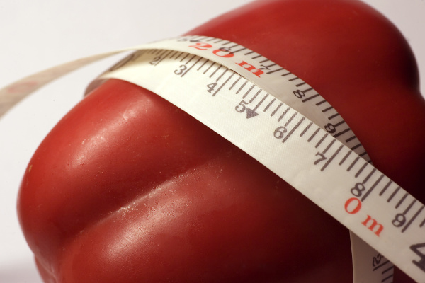 red pepper with tape measure