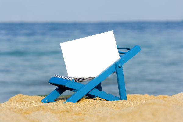 a deck chair on the beach