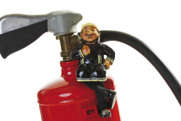 firefighter decorative figure on fire
