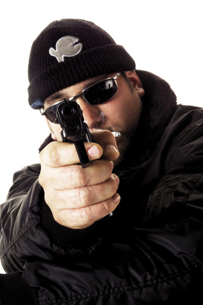 masked man with pistol