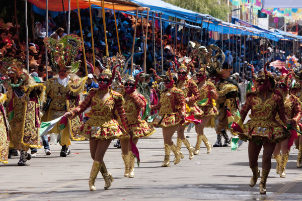 diablada dancers wearing elaborate devil masks